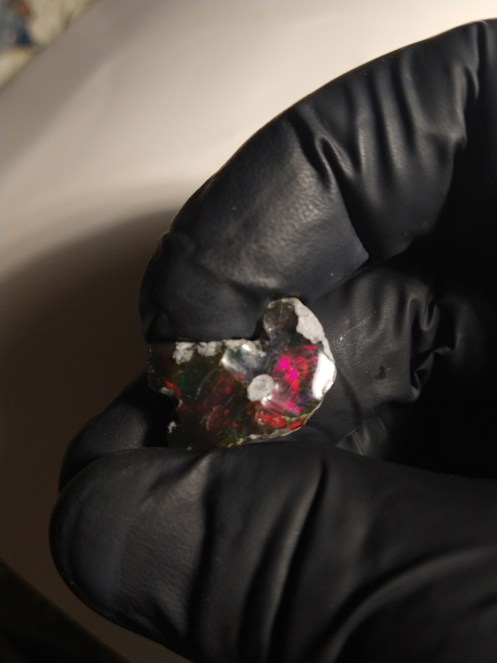 12.7 carat fiery red natural black smoked opal rough gem